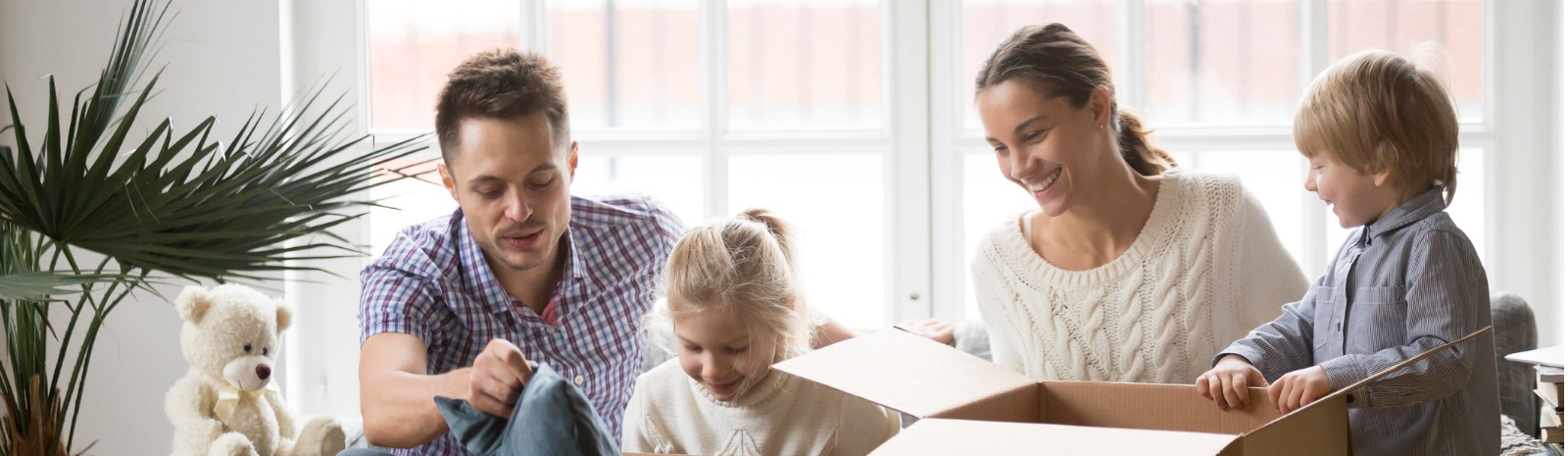 Family unpacking box