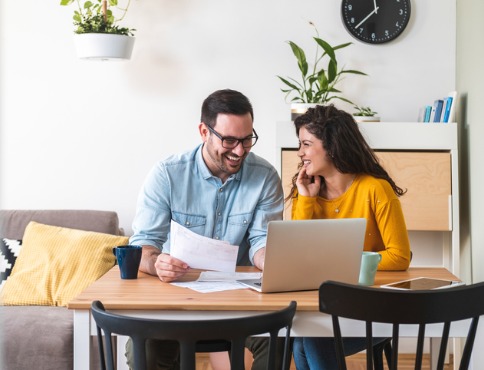 Man and woman on laptop